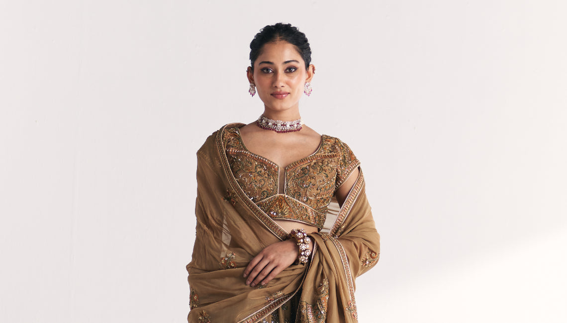 Kasturi Gold Lehenga Set – A Royal Bridal Outfit for Elegant Wedding Celebrations