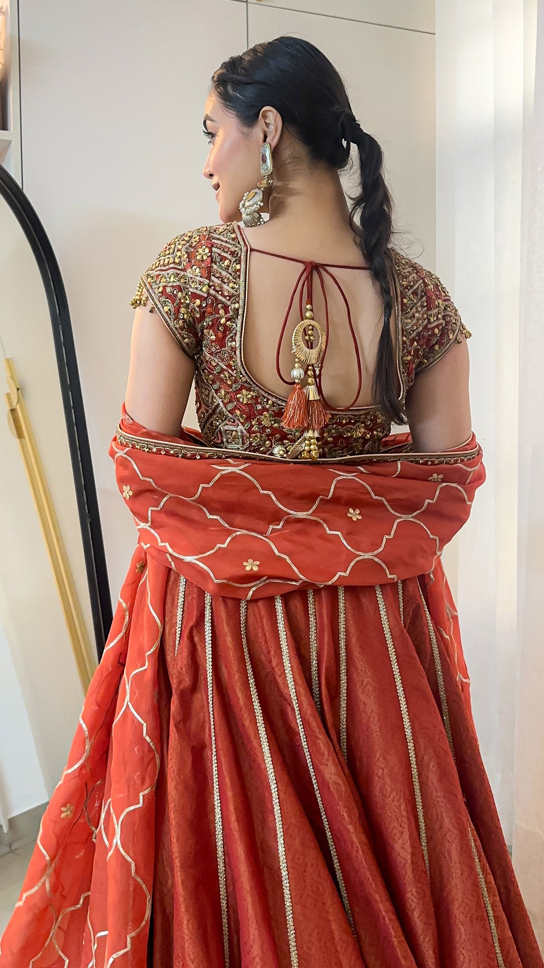 Akshita vohra In Padma Rust Lehenga Set
