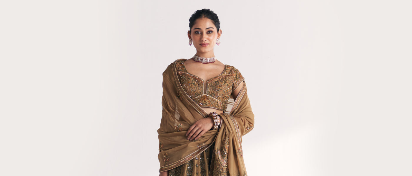 Kasturi Gold Lehenga Set – A Royal Bridal Outfit for Elegant Wedding Celebrations