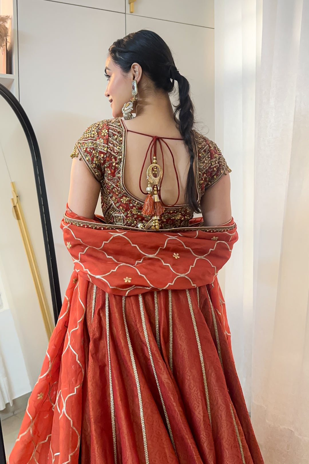 Akshita vohra In Padma Rust Lehenga Set