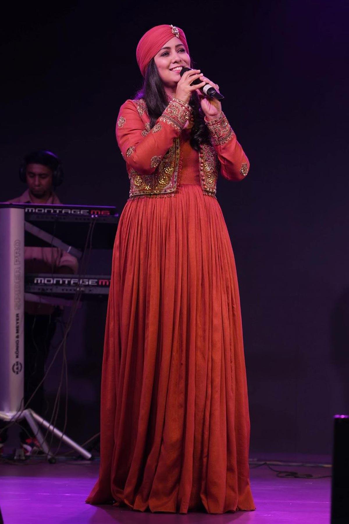 Harshdeep Kaur in Madhavi Brick Red Anarkali With Mughal Embroidery - Studio Bagechaa