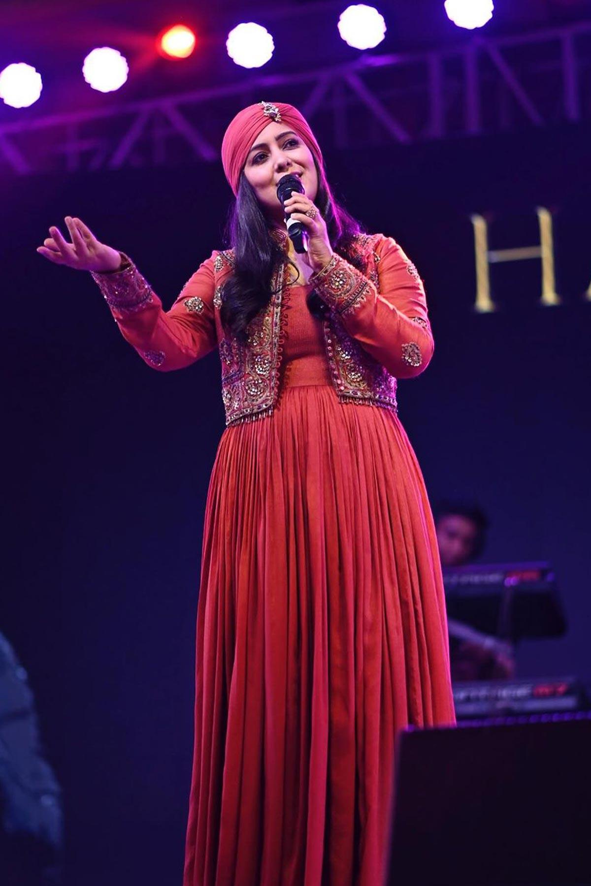Harshdeep Kaur in Madhavi Brick Red Anarkali With Mughal Embroidery - Studio Bagechaa